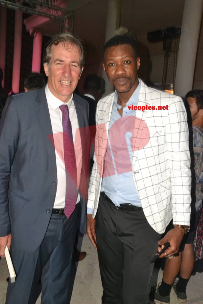 Le patron du site vipeoples, Tange Tandian et son épouse en compagnie de SEM Christophe Bigot ambassadeur de la France à la Féte de la Révolution Française.
