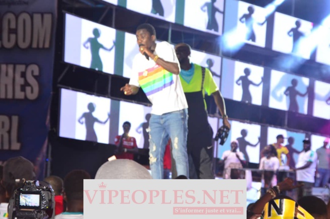 Concert Fan Zone avec Wally Seck, la place de la nation inondait de monde après la victoire du Sénégal face à l'Ouganda. Concert Fan Zone avec Wally Seck, la place de la nation inondait de monde après la victoire du Sénégal face à l'Ouganda.