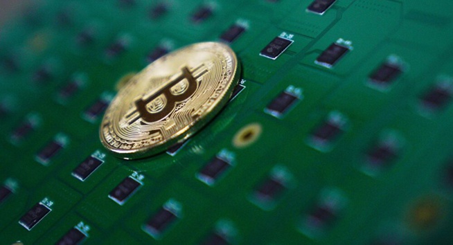 La barre des 57.000 dollars de nouveau franchie par le bitcoin La barre des 57.000 dollars de nouveau franchie par le bitcoin