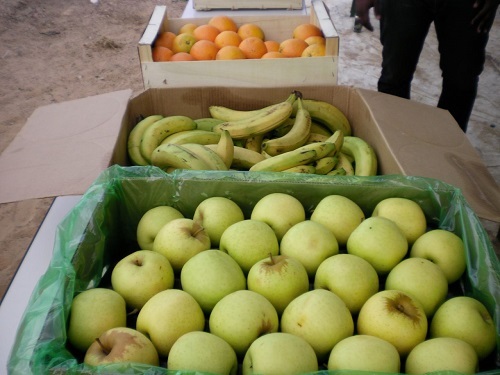 Photos:" Distribution de "ndogou" avec la Fondation Keur Rassoul