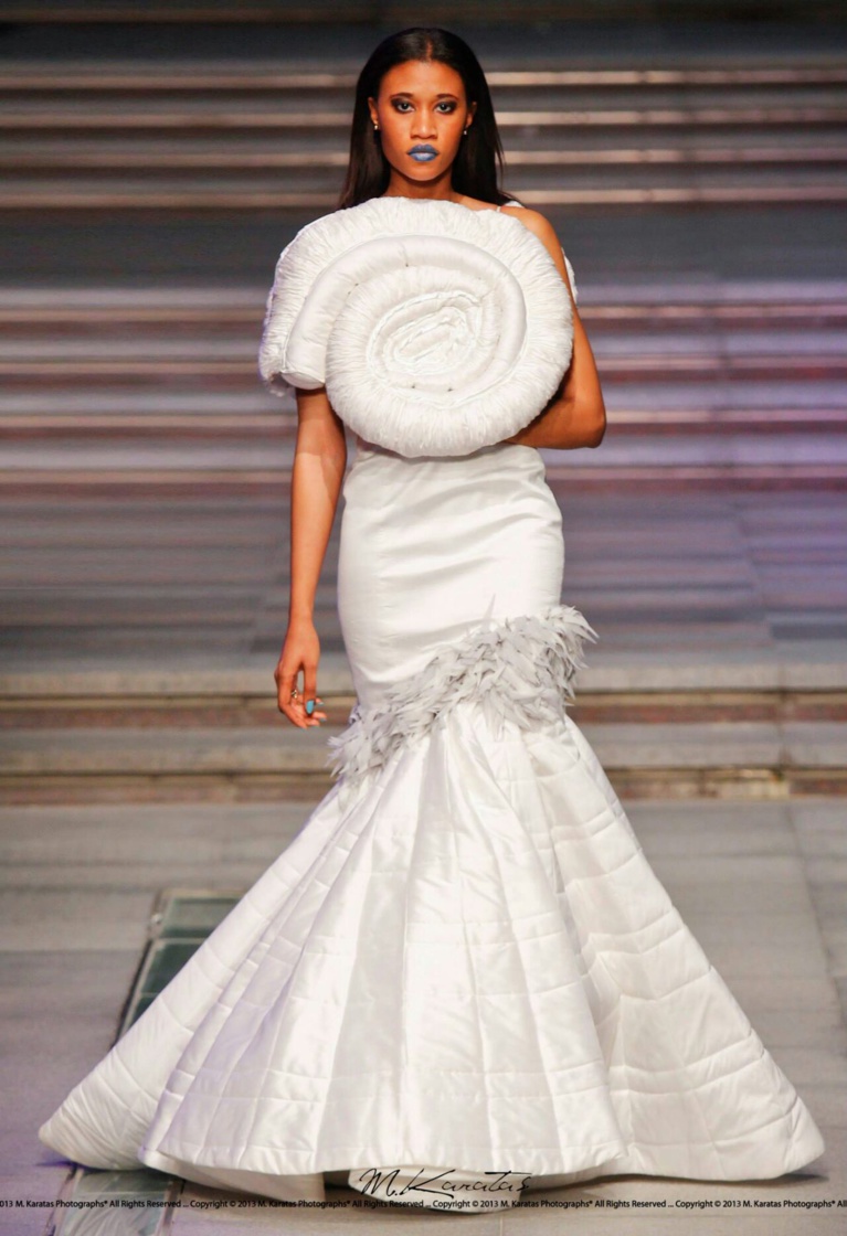La Gambienne Régina Maneh ex miss Face of Africa Fashion Week London 2013 sur le podium.