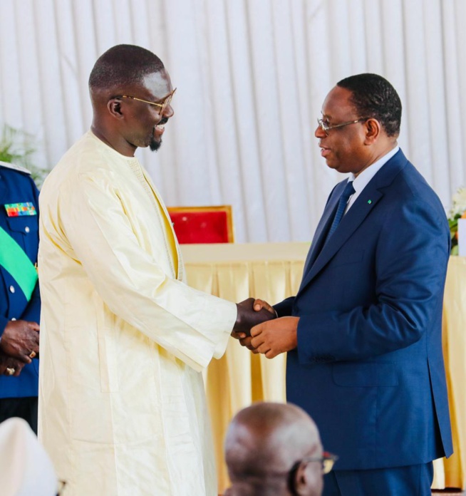 Moustapha DIeng, PCA du FDCUIC, co-fondateur de la Marmite du Coeur et PDG de Sen'Art Vision est élevé au grade de Chevalier de l'Ordre National du Lion. Moustapha DIeng, PCA du FDCUIC, co-fondateur de la Marmite du Coeur et PDG de Sen'Art Vision est élevé au grade de Chevalier de l'Ordre National du Lion.