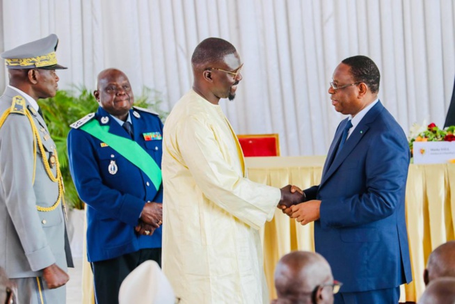 Moustapha DIeng, PCA du FDCUIC, co-fondateur de la Marmite du Coeur et PDG de Sen'Art Vision est élevé au grade de Chevalier de l'Ordre National du Lion. Moustapha DIeng, PCA du FDCUIC, co-fondateur de la Marmite du Coeur et PDG de Sen'Art Vision est élevé au grade de Chevalier de l'Ordre National du Lion.