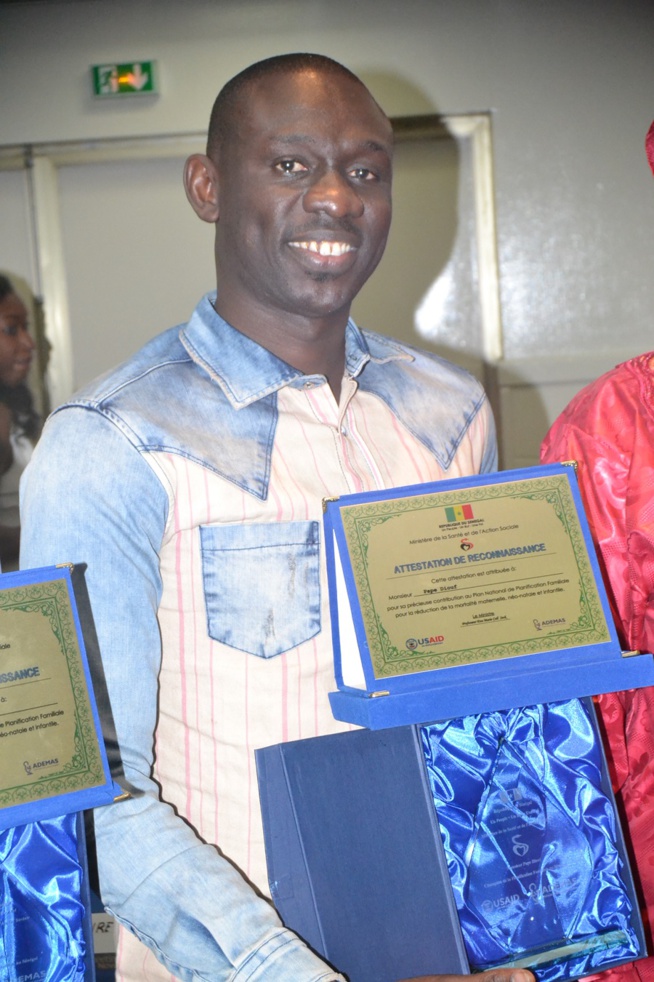 Pape Diouf nommé Champion de la planification familiale par le ministère de la santé et de l'action sociale. Pape Diouf nommé Champion de la planification familiale par le ministère de la santé et de l'action sociale.