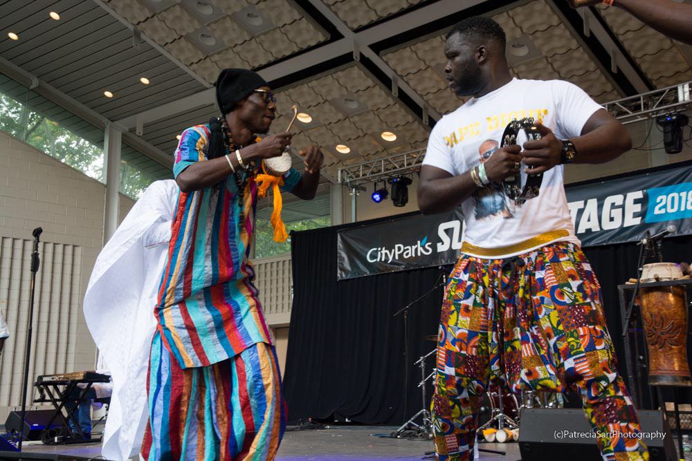 Quand le New African Production présente Pape Diouf au SUMMER STAGE de New York à la place Marcus Gravey. En images