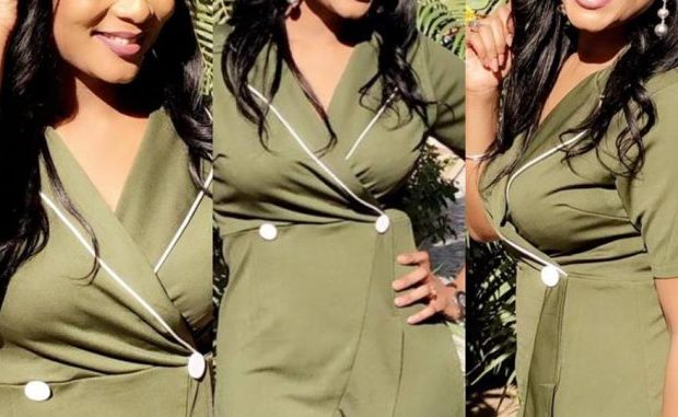 La belle Merry Beye Diouf de la Tfm très classe dans sa robe de couleur militaire