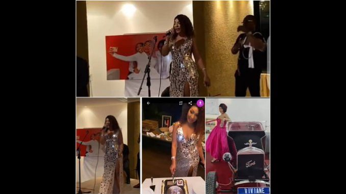 Viviane en robe décolletée et fendue pour son anniversaire. Regardez l’ambiance de la fête