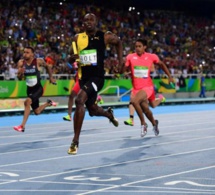Usain Bolt réussit le "triple triplé" : La légende continue !