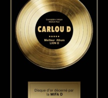 Un « disque d’or » a été décerné à Carlou D...